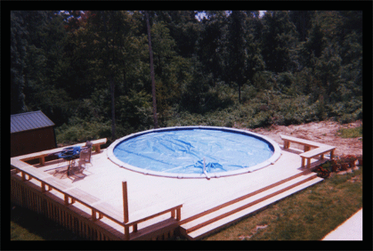 Building decks and fences around pool areas with bench seating for a nice area outside the pool. 
